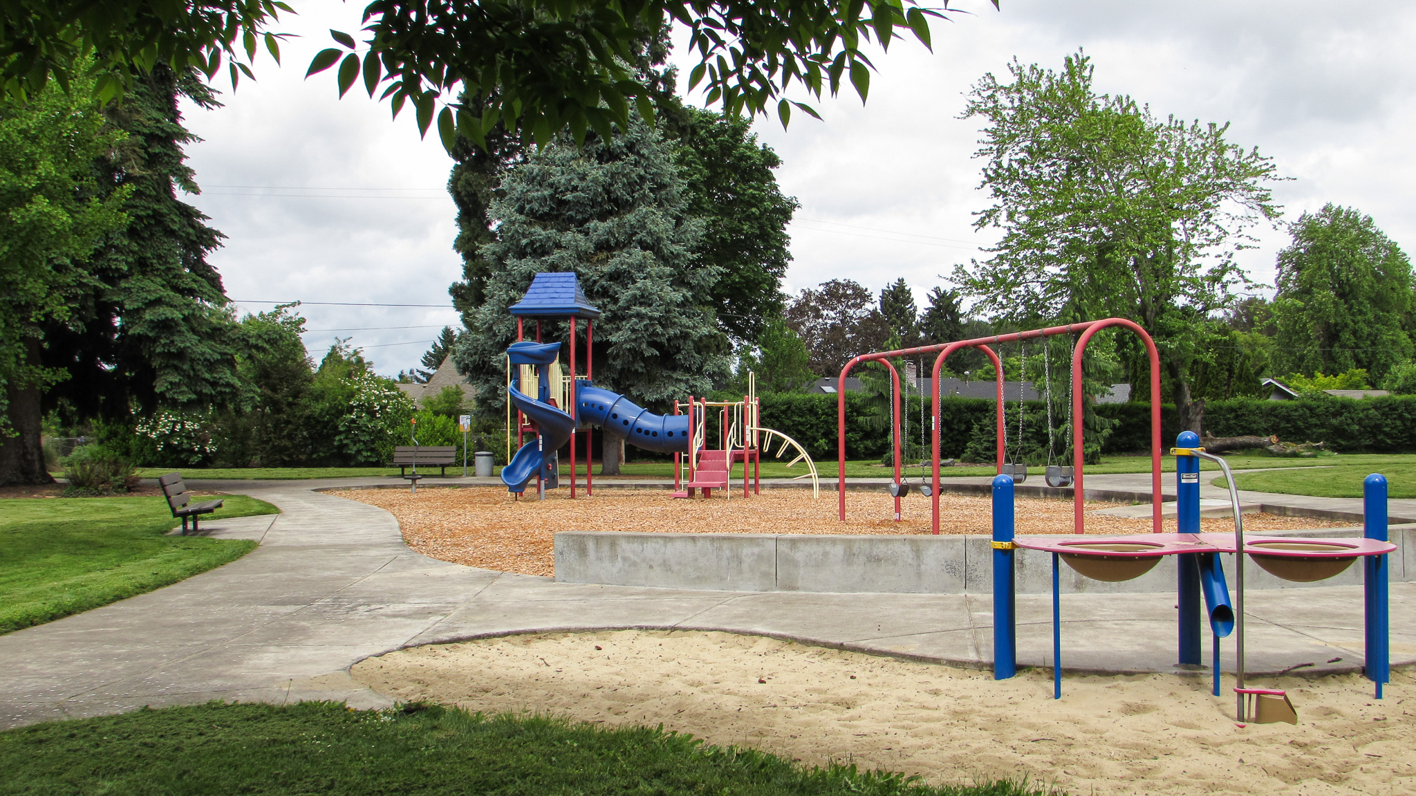 Playground and sand area at Royal Delle Park in summer