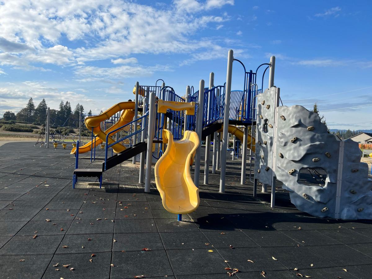 The playground at Quartz Park with slides and play equipment