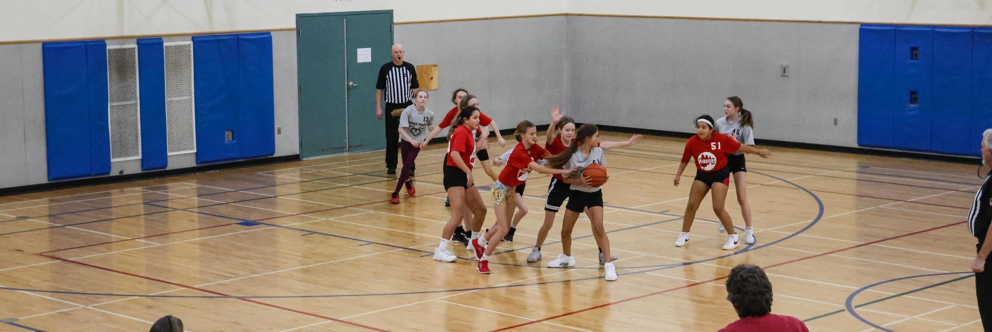 Middle school basketball game takes place