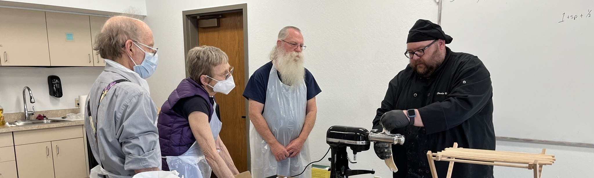 Cooking class learns to make pasta