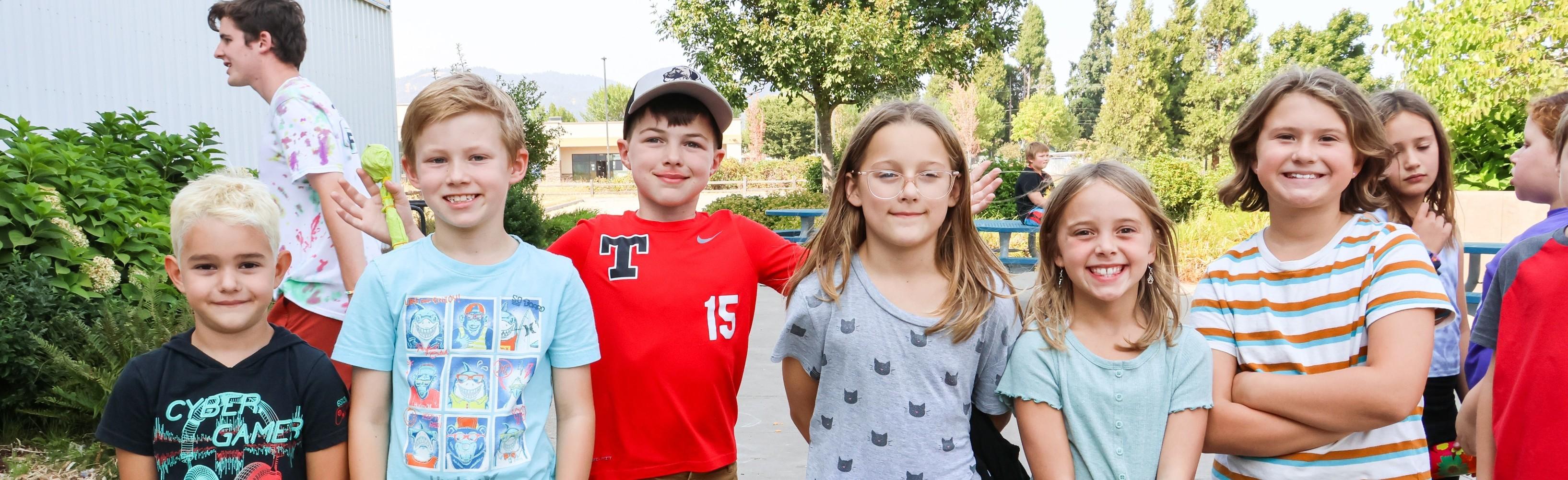 Kids smiling together at summer camp