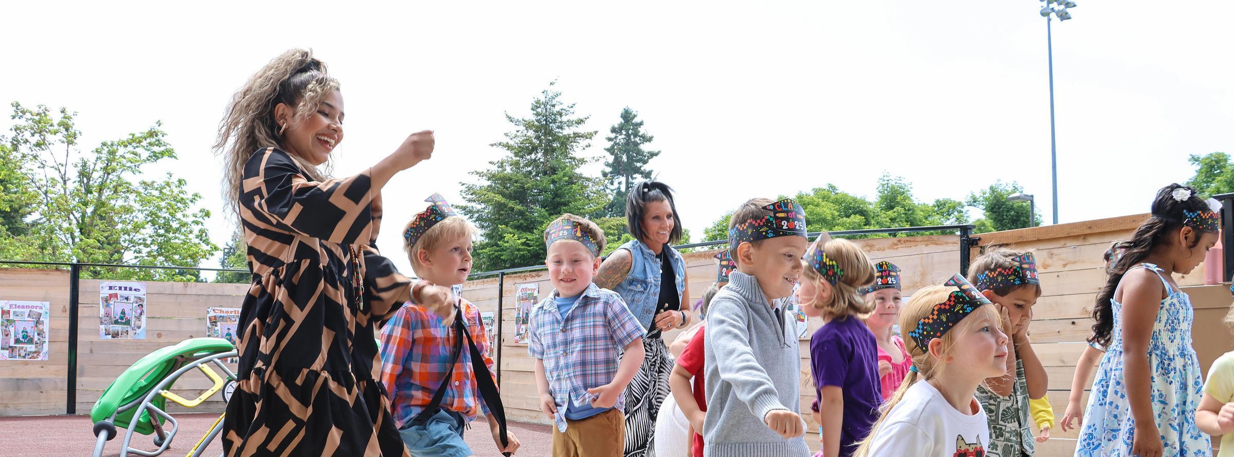 Preschoolers have fun on playground