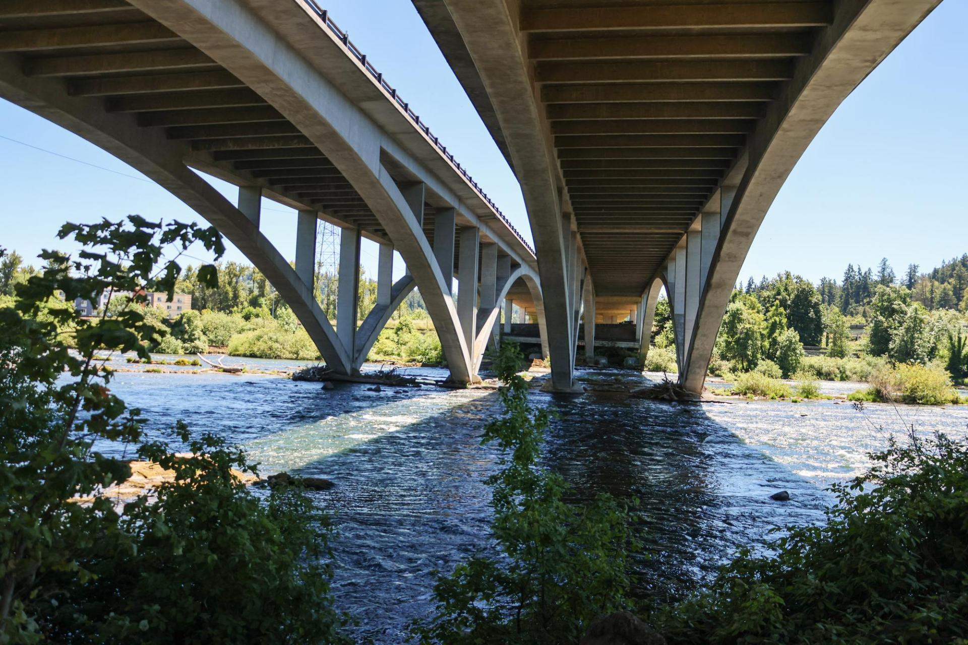 a view of the Willamette River from under the bridge